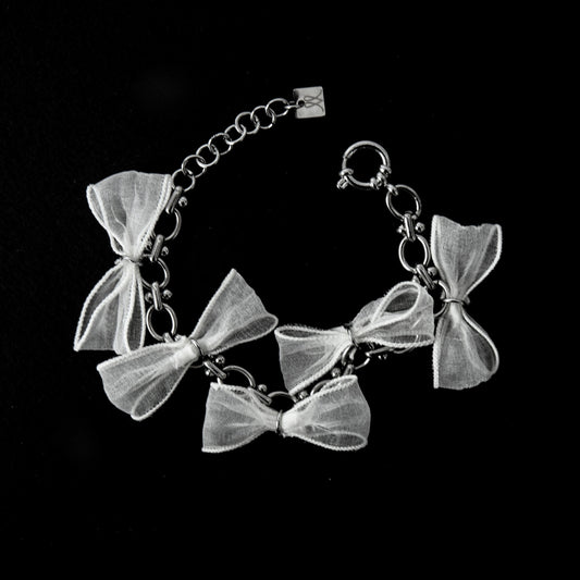 BRACELET AUX NOEUDS BLANCS